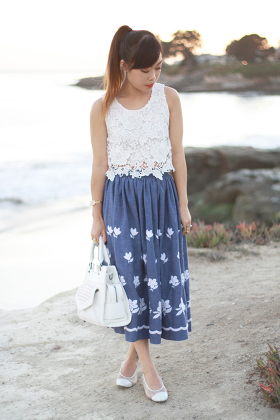 Toshiko in white lace and a blue skirt